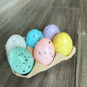 Pastel multi-color plastic speckled Easter Eggs with egg crate
